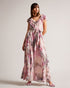 KARENIE-Dresses-The softest and most graceful maxi dress, KARENIE features a blurred floral print and finished with stunning waterfall frills that cascade down the front. Style yours with strappy sandals and minimal jewellery for an effortless look that will take you effortlessly through the season.The fabric of this product is made with 55% recycled polyester. Using recycled polyester helps divert plastic waste from ending in landfills, and helps us to reduce our dependence on virgin materials. Maxi dress